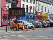 Mum Blaithin Corr trying to master vthe roadsign challenge. SHAKEDOWN THE TOWN, RTE TWO.