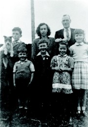 Ryan A Legacy. The Ryan family (Tony holding dog) , taken in Thurles, Co Tipperary, c.1950