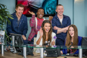 ORDINARY LIES - Ep6 JEZ (Kris Mochrie), ZIGGY (Fisayo Akinade), TRACY (Michelle Keegan) and AMELIE (Lauren McQueen) sit behind reception laughing.