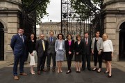 Election 2016 - Political Unit Group - RTE Political Unit pictured outside Leinster House, 08 July 2015 (L-R) Mícheál Ó Leidín - Poltical Correspondent RTÉ RnaG, Ailbhe Conneely - reporter), Brian Dowling - presenter &  reporter, Mícheál Lehane - reporter, Deirdre McCarthy - Politcial Assignments Editor, Edel McAllister - reporter, Sharon Geoghegan - reporter, David Davin-Power - Poltical Correspondent, Katie Hannon - RTÉ Prime Time Political Correspondent, and Martina Fitzgerald - Political Correspondent. Missing from photo but also in unit are Conor McMorrow - reporter, Sorcha Ni Riada - Political Correspondent Nuacht, Paul Cunningham - Editor and Aine Lawlor - presenter