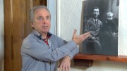 Nationwide 1916 - Conal Kearney, grandson of Peadar Kearney who wrote the National Anthem looking at a photo of his grandfather and father