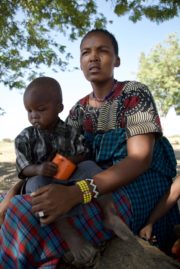 Farmer Sinyati Lazaro with her son, What in the World Series 11, episode 2 Tanzania