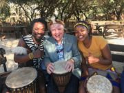 Francis Brennan's Grand Tour South Africa - Francis Brennan at the Lesedi Cultural Village with Themba and Slenda.