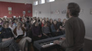 David Brophy rehersing with the choir