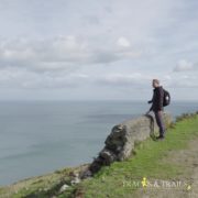 Pol looking over cliff