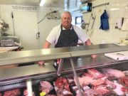 Butcher Seán Ó Finneadha in Feeney's Butchers, An Spidéal