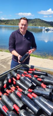 (38)Neven's Portuguese Food Trails programme three. Neven Maguire with bottles of 'Underwater Wine' made by the Ervideira Winery (Alentejo regio