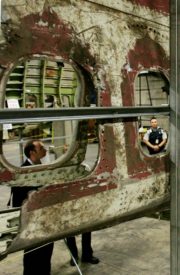 Wreckage of the Air India jet that was bombed over the Atlantic in 1985 is on display in an undisclosed location in Vancouver, British Columbia June 15, 2004. Media were allowed to view the remains of the flight that went down of the Irish coast after a b