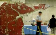 Wreckage of the Air India jet that was bombed over the Atlantic in 1985 sits on display in an undisclosed location in Vancouver, British Columbia June 15, 2004. Media were allowed to view the remains of the flight that went down off the Irish coast after