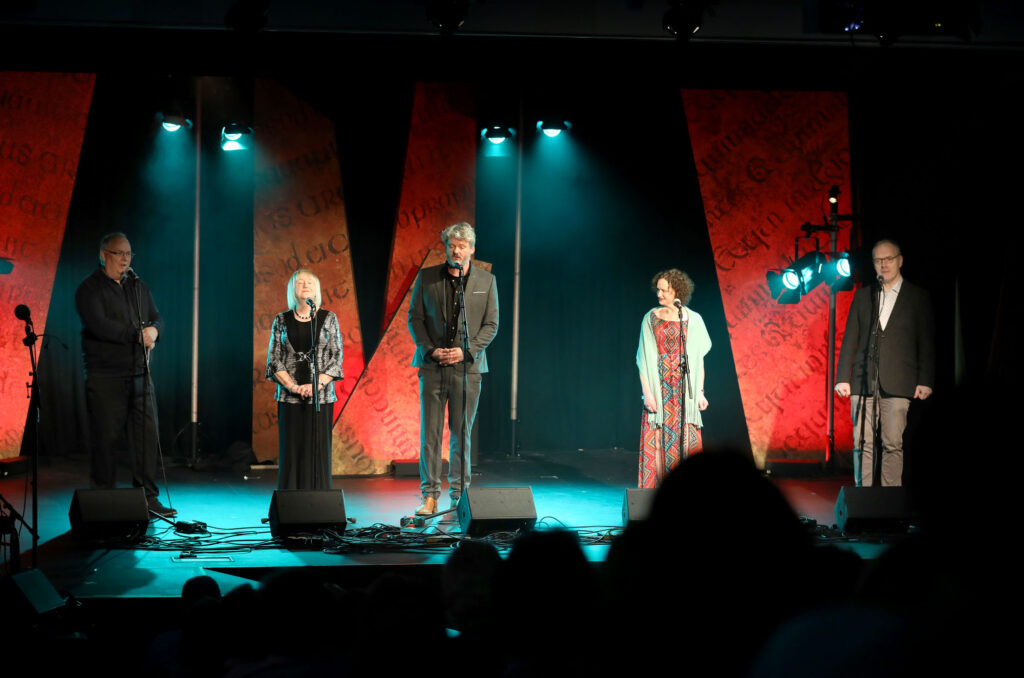 Brian Danny Minny, Gearóidín Breathnach, Doimnic Mac Giolla Bhríde, Máire Ní Choilm, Lillis Ó Laoire on stage during RnaG50 Feb 2023
