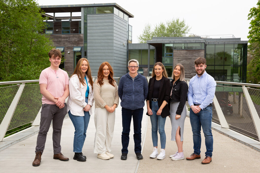 Áine Hensey, centre, pictured with students frm the University of Limerick who took part in Ar Bhruach na Sionainne