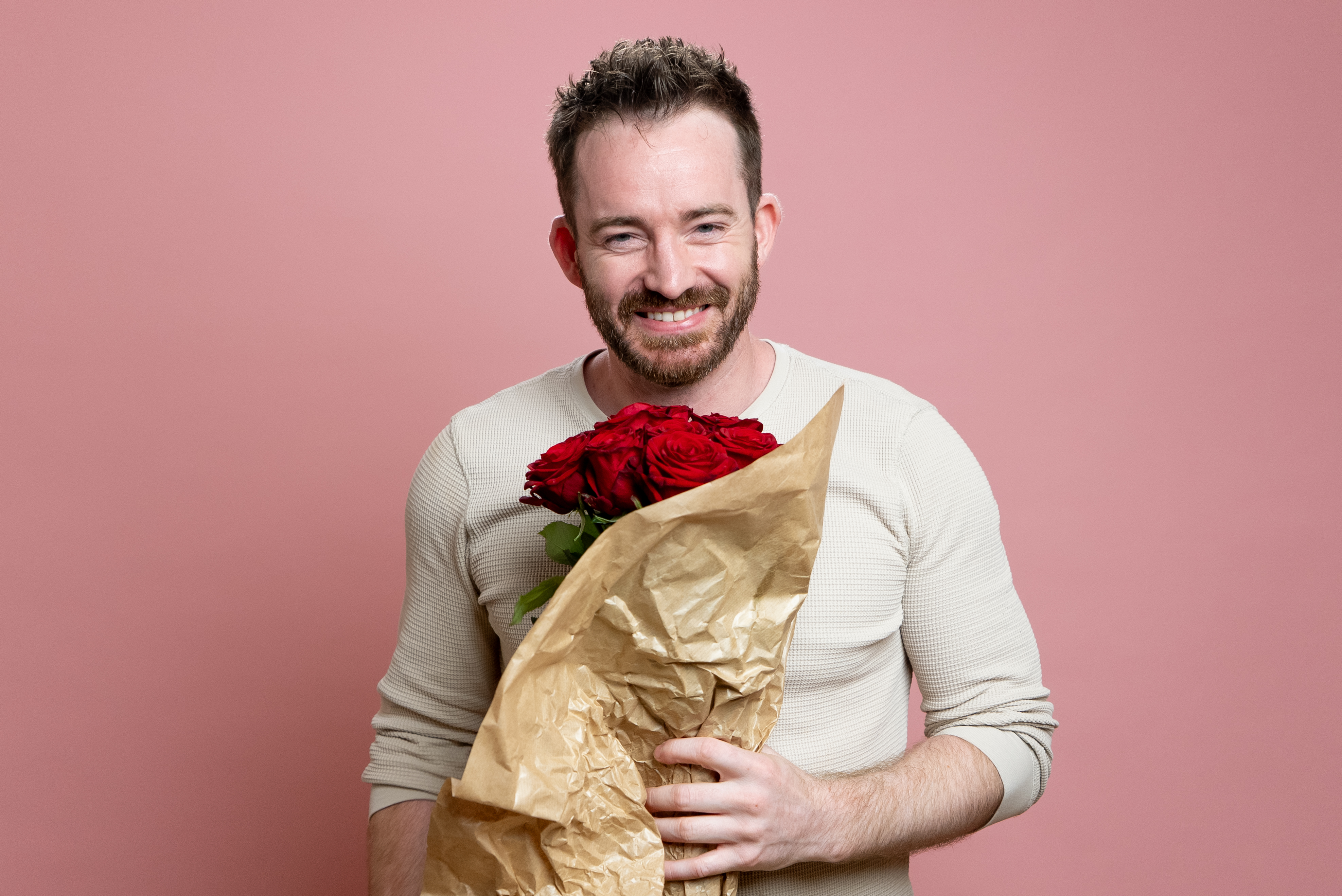 Keith from First Dates Season 11 Episode 01 holding flowers in hopes of finding love.